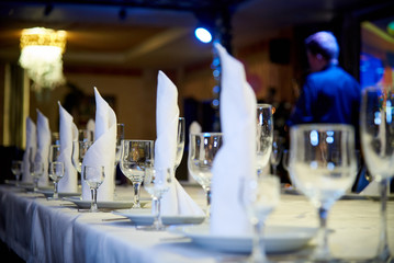 Empty wine glass on the banquet table.Table setting for a banquet or dinner party.