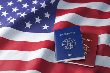 Passports on the flag of the US United Stetes. Getting a visa to USA ,  travel, naturalization and immigration concept.
