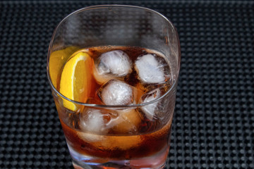 Negroni cocktail in old fashioned glass with orange slice