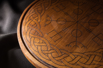 Ouija Board, yellow on a black background