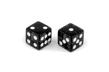 Two black glass dice isolated on white background. Two and one.