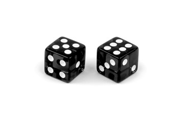 Two black glass dice isolated on white background. Five and six.