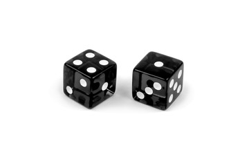 Two black glass dice isolated on white background. Four and one.