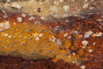 yellow brown spotted stone background for text