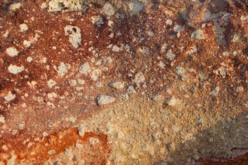 yellow red spotted stone background for text