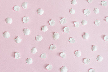 Backgrounds and textures. White apricot petals on a pink background. Close-up