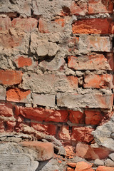 old collapsing brick wall close up