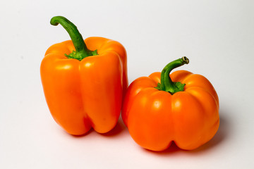 two orange peppers