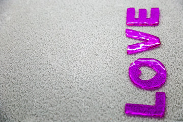 Love message written on the gray background