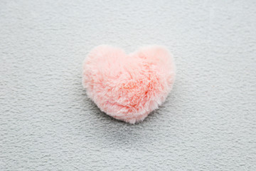 Pink heart on the gray background