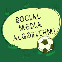 Text sign showing Social Media Algorithm. Conceptual photo Sorting all post and show the most popular to user Soccer Ball on the Grass and Blank Outlined Round Color Shape photo