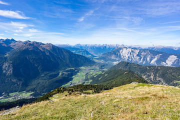 Fototapeta na wymiar Mountains, peaks, lake, everlasting ice and trees landscape. Kaunertaler Gletscher natural environment. Hiking in the alps, Kaunertal, Tirol, Austria, Europe