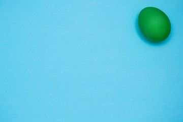 Easter egg on colored background