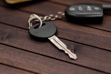 Car key on a wooden background 