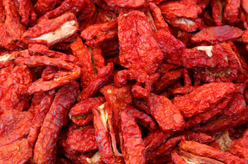red dried sun-dried tomatoes by sun for sale in the local market