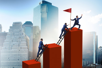 Businessman in career growth and progression concept