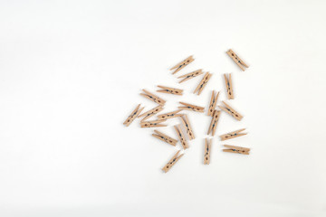 wooden clothespins isolated on white background