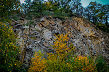 Old flooded quarry in autumn