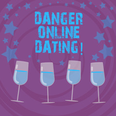 Conceptual hand writing showing Danger Online Dating. Business photo text The risk of meeting or dating demonstrating meet online Filled Cocktail Wine with Scattered Stars Confetti Stemware