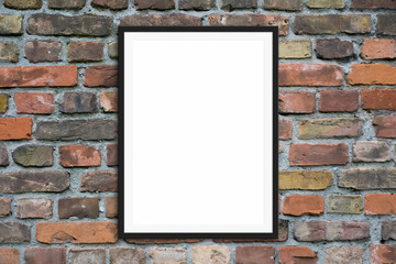 blank picture frame hanging on  brick wall -  framed poster mock-up with stone wall background  -