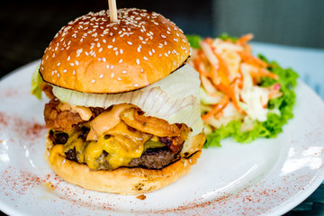 Texan Burger, Sweet pickles, fried onions, maple grilled bacon, cheddar cheese, grilled beef patty and Texan BBQ mayo