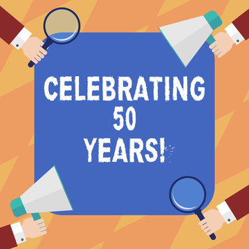 Text sign showing Celebrating 50 Years. Conceptual photo Golden Anniversary Commemorating a special day Hu analysis Hands Each Holding Magnifying Glass and Megaphone on 4 Corners