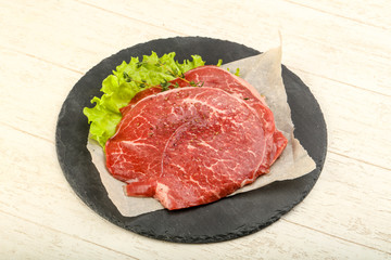 Raw beef schnitzel