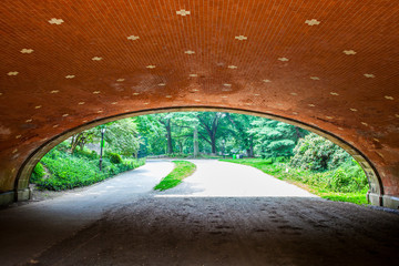 View of underpass in Central Park in New York City during sunny summer daytime