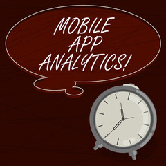 Text sign showing Mobile App Analytics. Conceptual photo Apps that analyse data generated by mobile platforms Blank Color Thought Speech Bubble with Outline and Alarm Clock photo