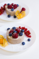 Food. Souffle, raspberries, blueberries, physalis