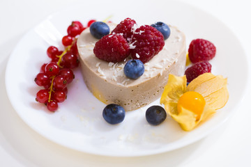 Food. Souffle, raspberries, blueberries, physalis