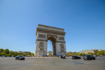 Fototapeta na wymiar PARIS, FRANCE - JULY 14 2018: The Arc de Triomphe de l'Etoile in Paris in a summer day