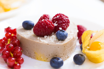 Food. Souffle, raspberries, blueberries, physalis