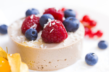 Food. Souffle, raspberries, blueberries, physalis