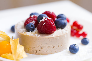 Food. Souffle, raspberries, blueberries, physalis