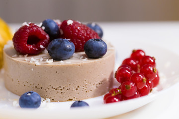 Food. Souffle, raspberries, blueberries, physalis