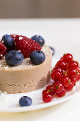 Food. Souffle, raspberries, blueberries, physalis