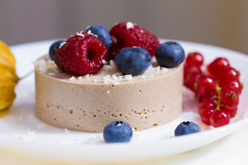 Food. Souffle, raspberries, blueberries, physalis