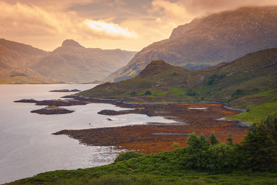 Sunset at the Gleann Dubh loch in Unapool, northwest coast Scotland