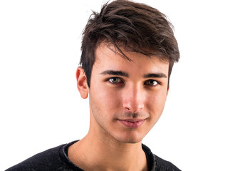 Naklejka premium Close-up of handsome young man or teenager in studio, isolated on white background