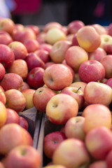 Piles of Apples in Crates at a Farmer's Market
