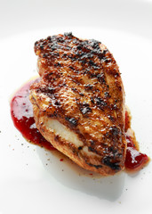 Grilled chicken breast with cranberry sauce