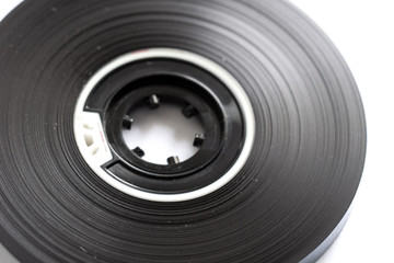 Compact audio cassette tape reels concept closeup