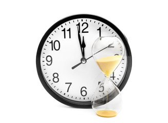 Hourglass with clock on white.