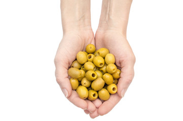 Woman's hands holding olives in palms. Isolated on white.