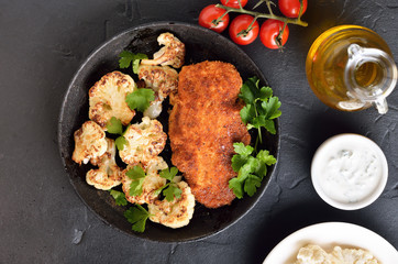 Chicken breast and fried cauliflower