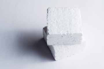 Two pieces of white styrofoam