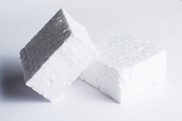 Two pieces of white styrofoam