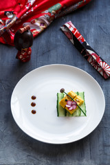 Traditional tamagoyaki Japanese omelette on on a plate, restaurant dish