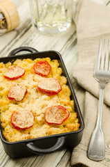 Baked macaroni and cheese. Casserole dish with baked macaroni and cheese 